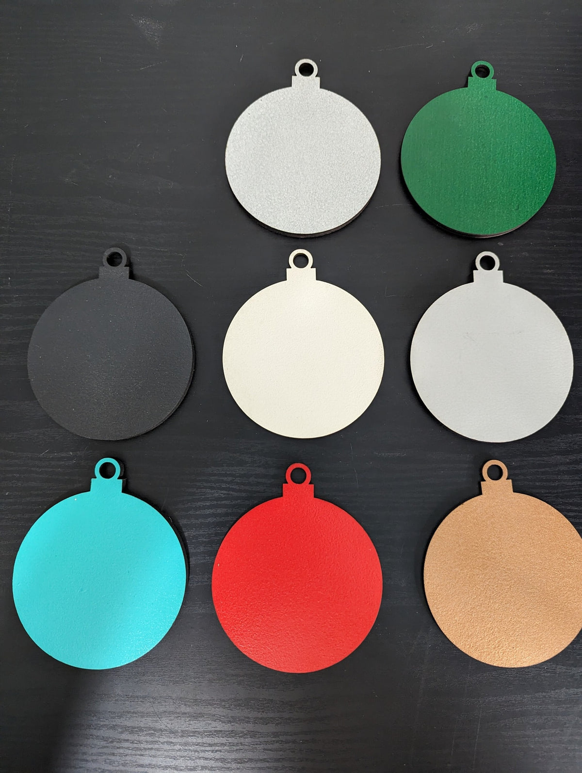 Eight background colors on their own: silver, green, black, white, gray, teal, red and copper.