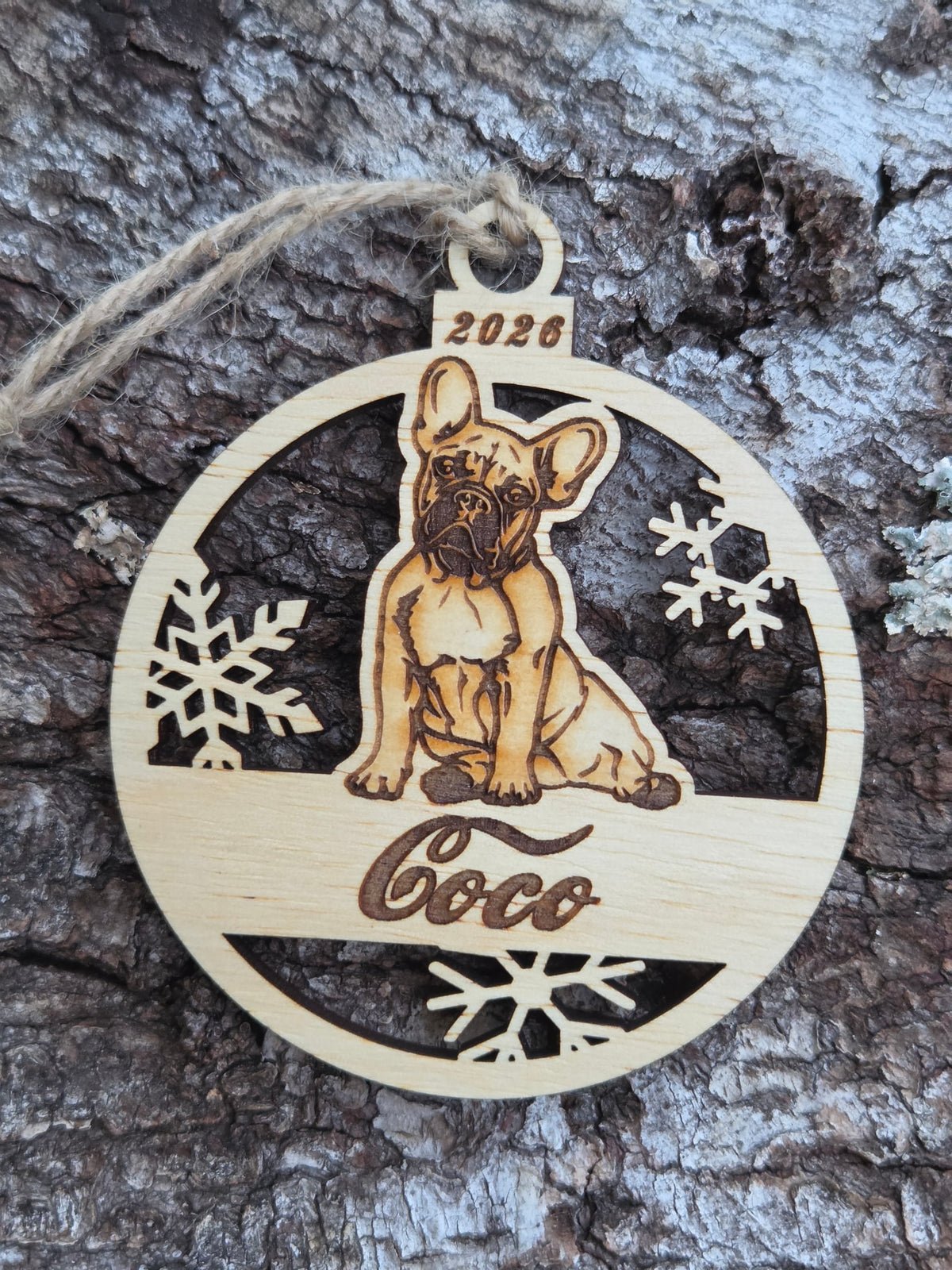 Wooden sitting French Bulldog ornament, front layer with a sample name and year engraved, shown without its colored back
